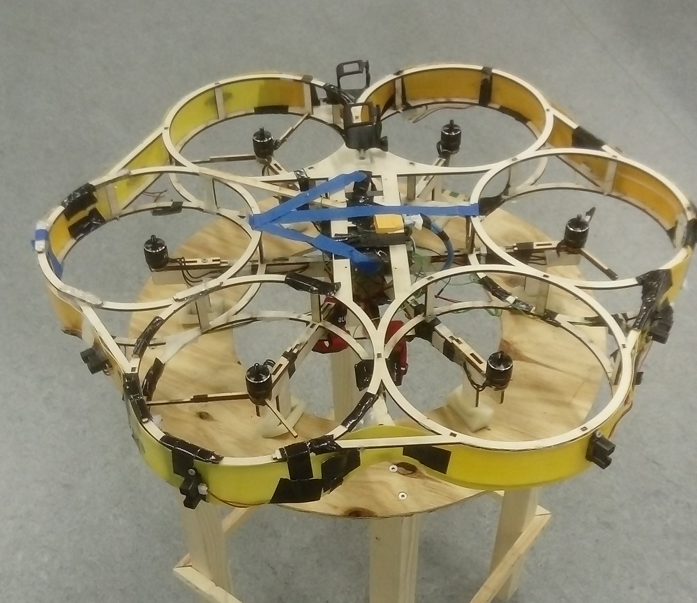 The autonomous drone. Direction of flight marked with blue tape.